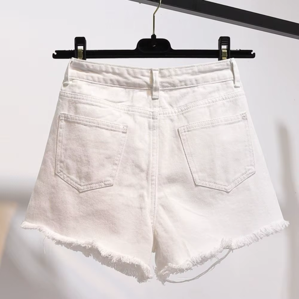 Shorts en jean tendance déchirés taille haute, polyvalents, avec ourlet effiloché et franges, 2024