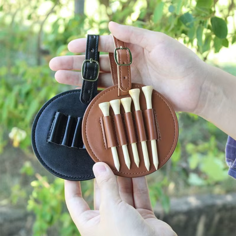 Accessoires de golf : Sac de rangement portable pour tees de golf en cuir PU, avec trous de rangement pour tees en bois, fixation facile sur ceinture, pour hommes et femmes