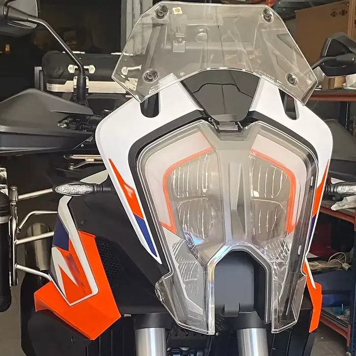 Couvercle de protection des phares de moto