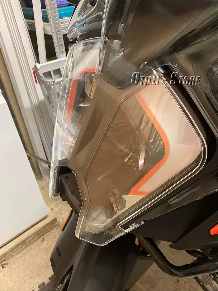 Couvercle de protection des phares de moto